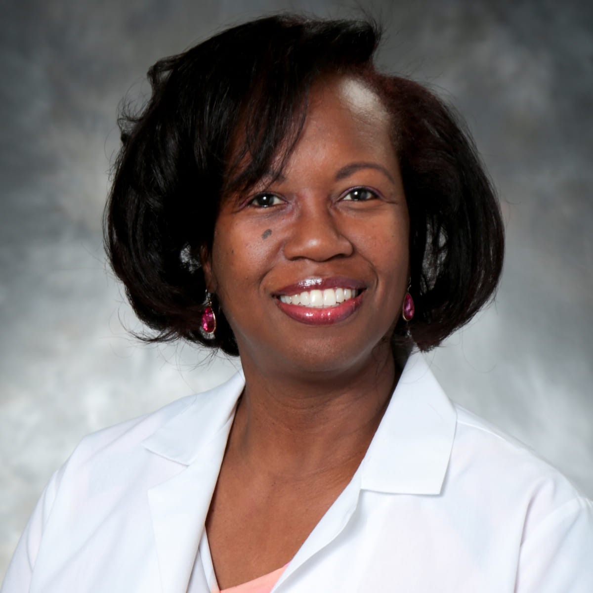 Dr. Tangela Atkinson, MD
