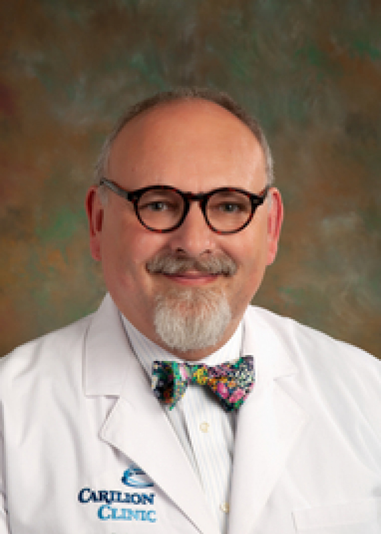 Dr. Xavier Preud homme, MD