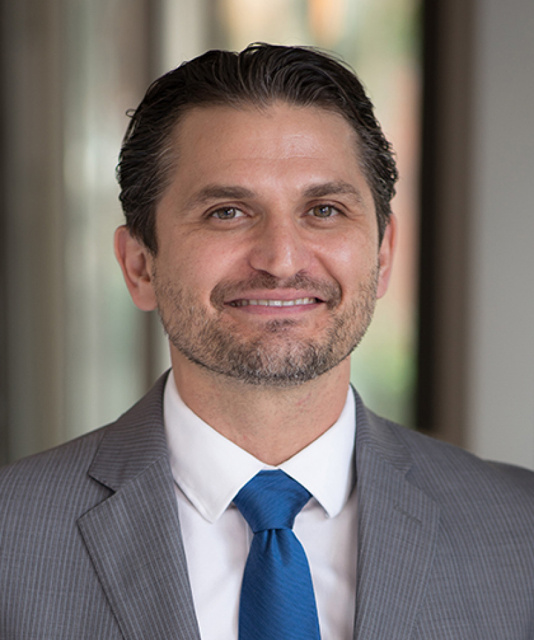 Dr. Carlos Alvarado, MD
