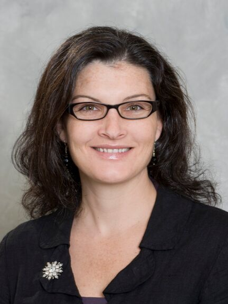 Dr. Sara August, MD