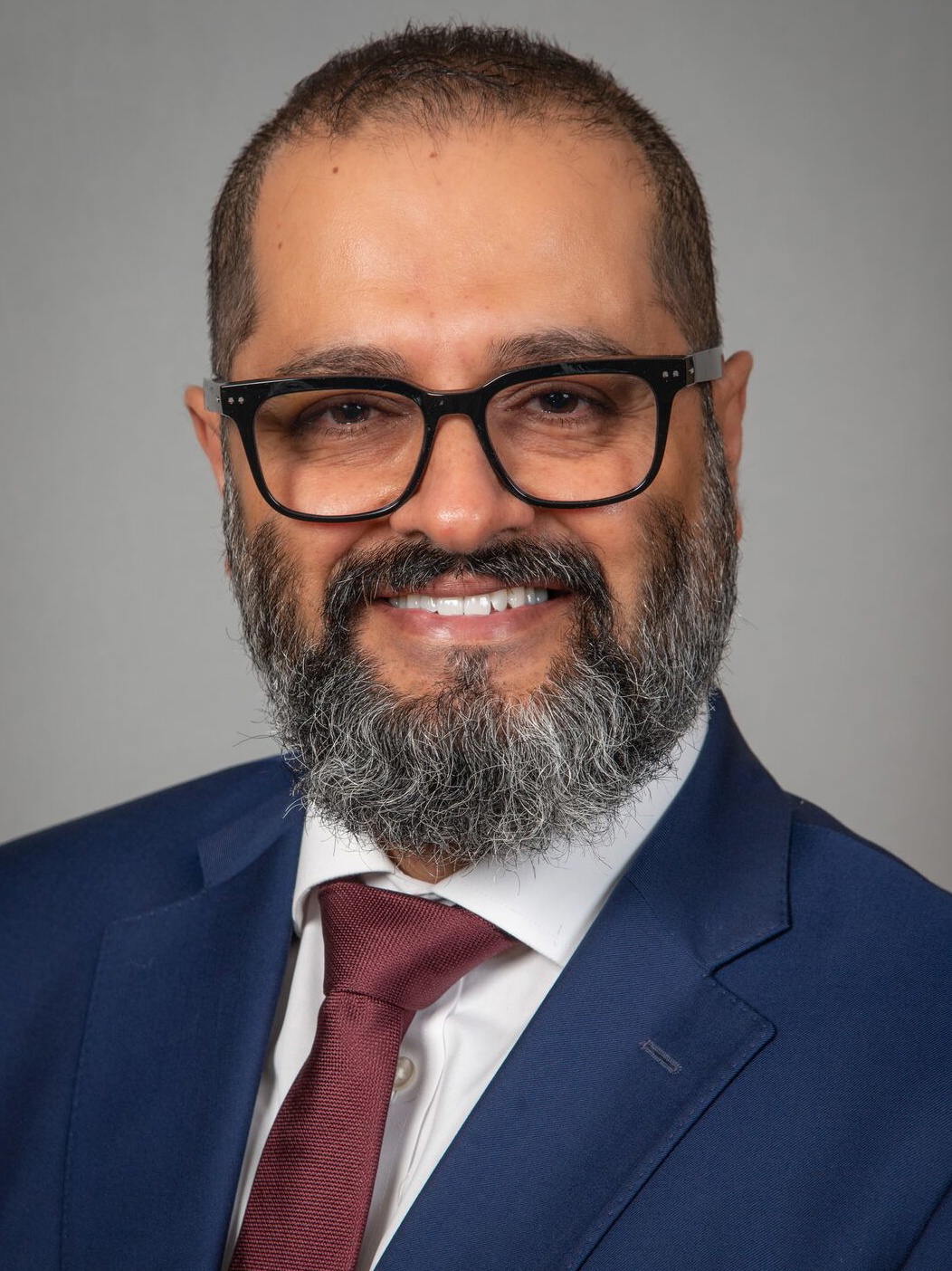 Dr. Pejman Radkani, MD