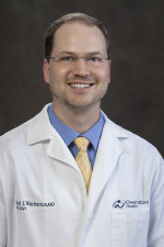Dr. Daniel Warburton, MD