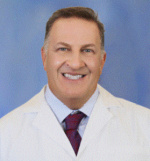 Dr. Ralph Breslaw, MD