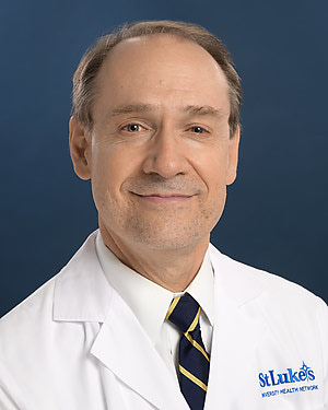 Dr. Norman Sykes, MD