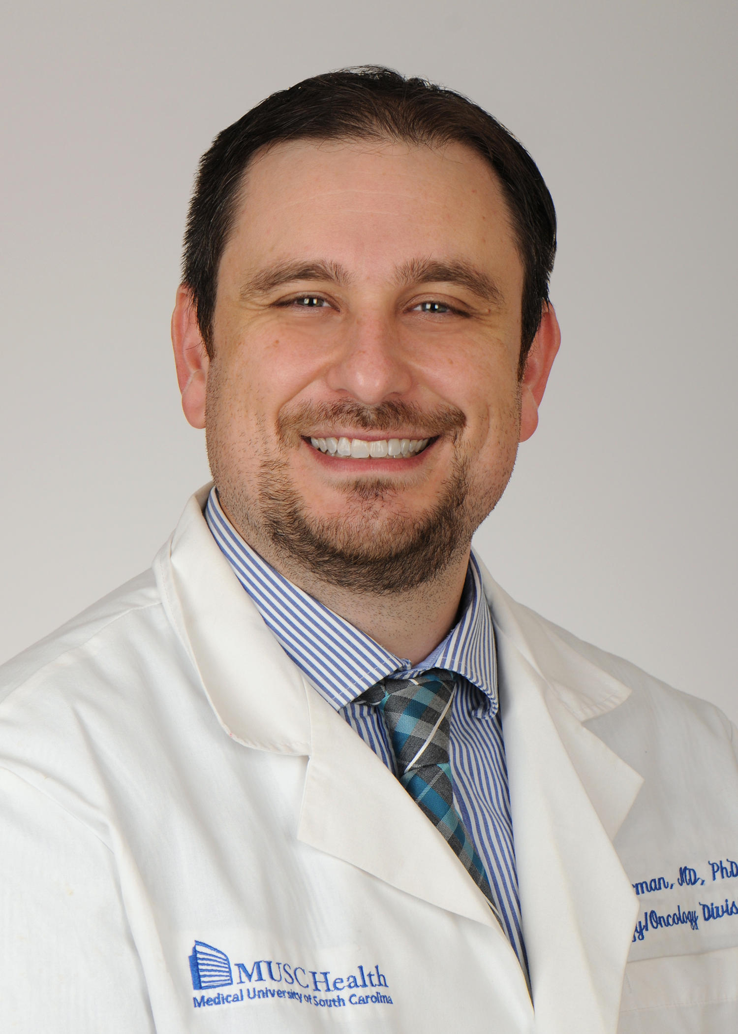 Dr. Toros Dincman, MD