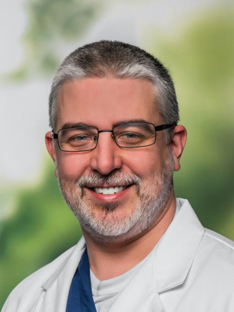 Dr. Travis Greer, MD