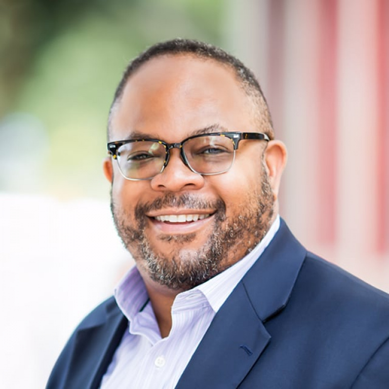 Dr. Malcolm John, MD