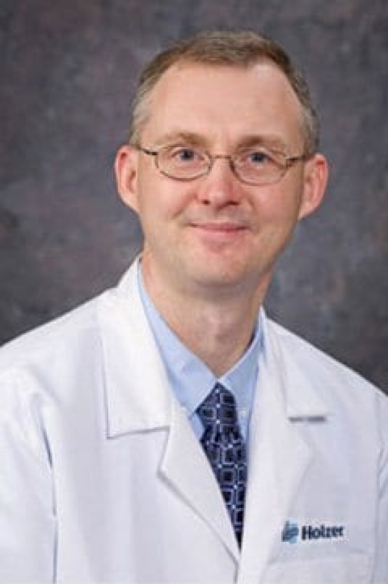 Dr. Jeremy Cuzzourt, MD