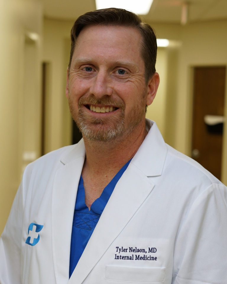 Dr. Tyler Nelson, MD