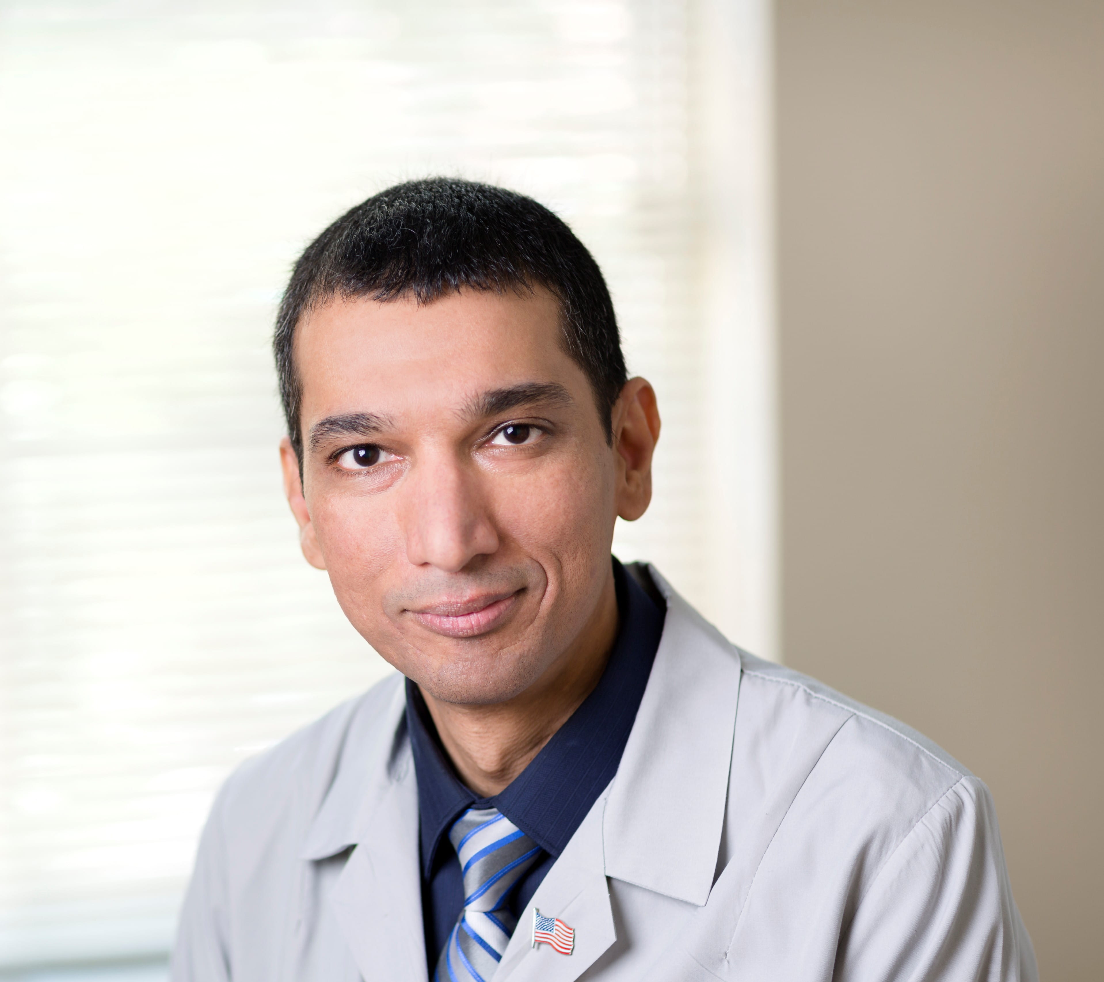 Dr. Faisal Qureshi, MD