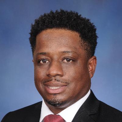 Dr. Clive Woods, MD