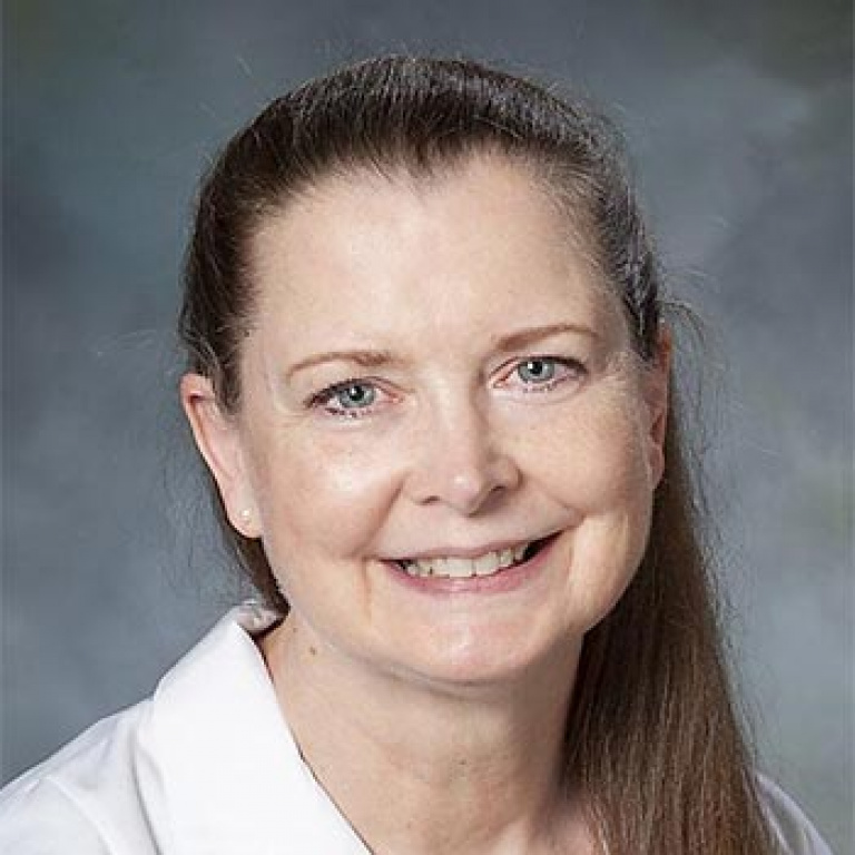 Dr. Mignon Makos, MD