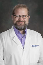 Dr. M Damon Kolok, MD