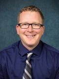 Travis Booke, PA-C