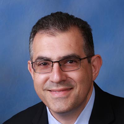 Dr. Gilbert Simoni, MD