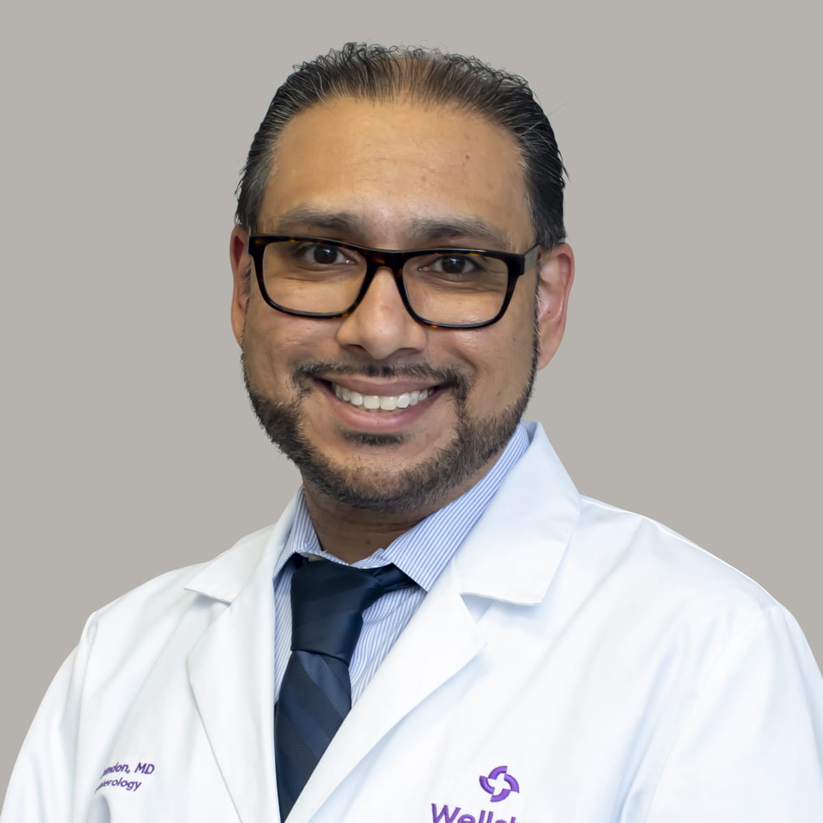 Dr. Inder Tandon, MD