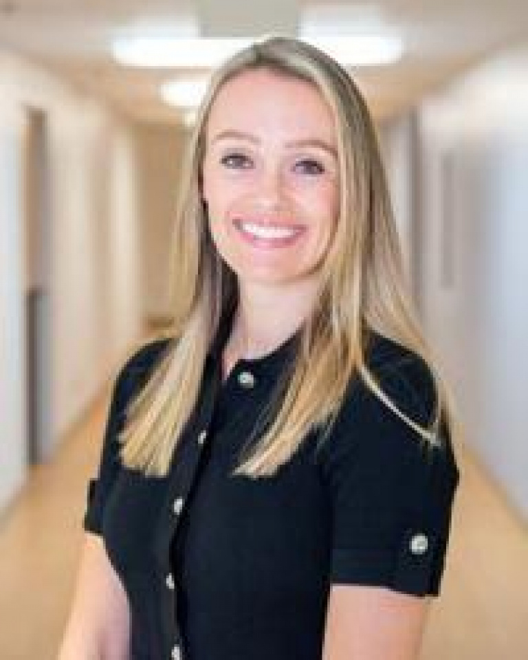 Dr. Trisha Tomkins, MD