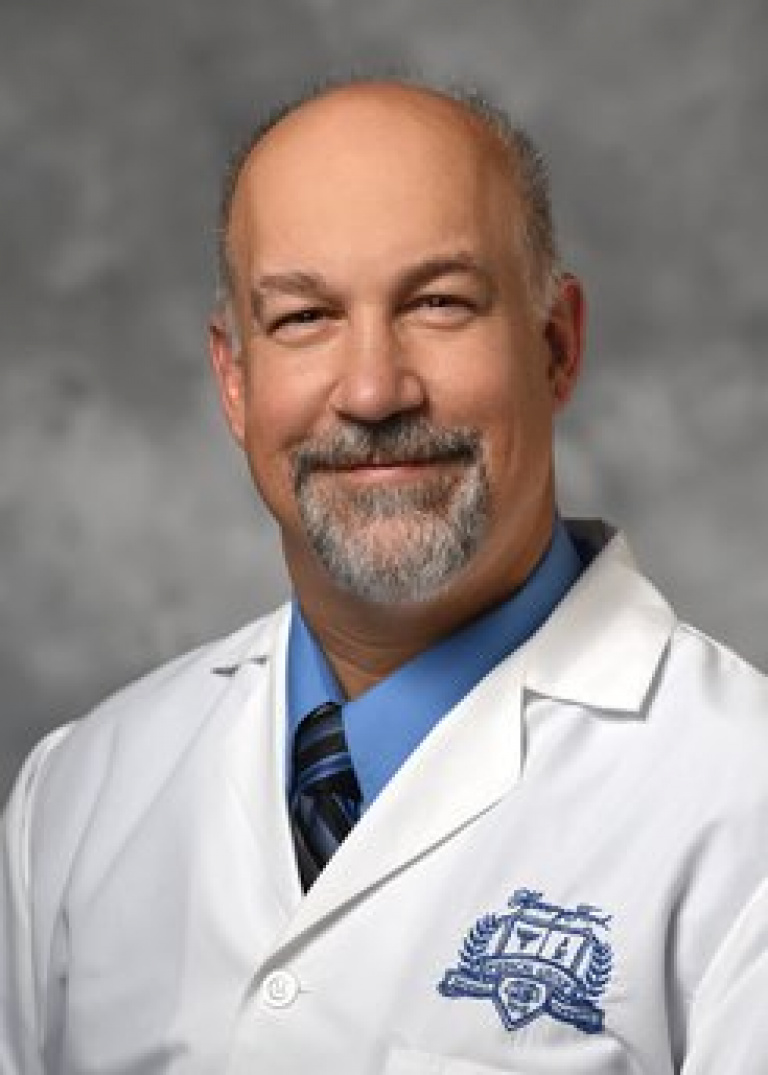 Dr. Clark Creger, MD