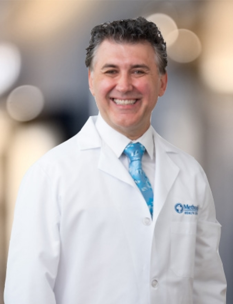 Dr. Arash Manzori, MD