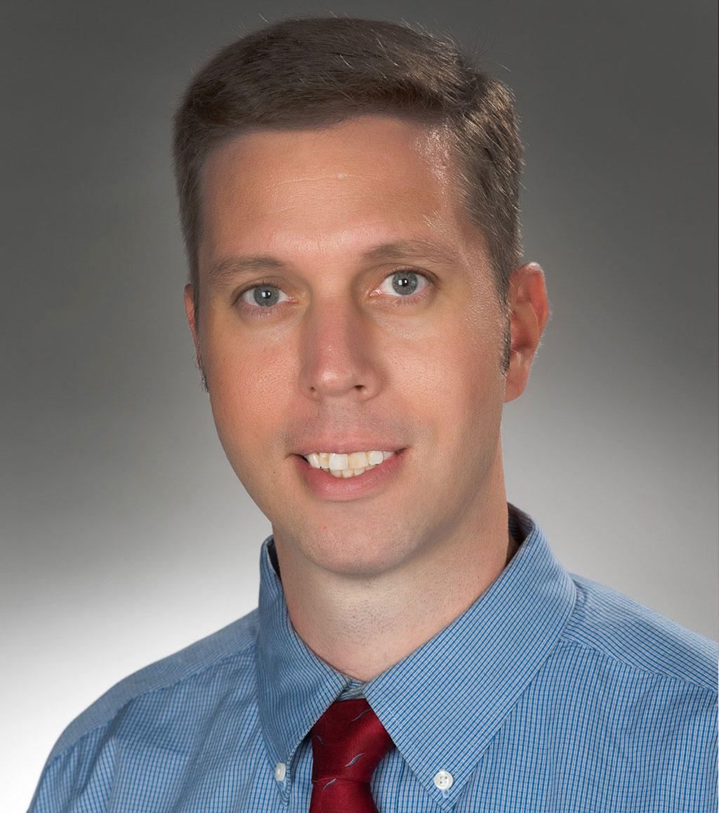 Dr. Adrian Lacy, MD