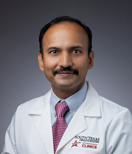 Dr. Augustine George, MD