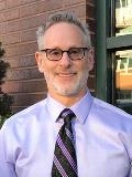 Dr. Gary M Treinkman, DDS