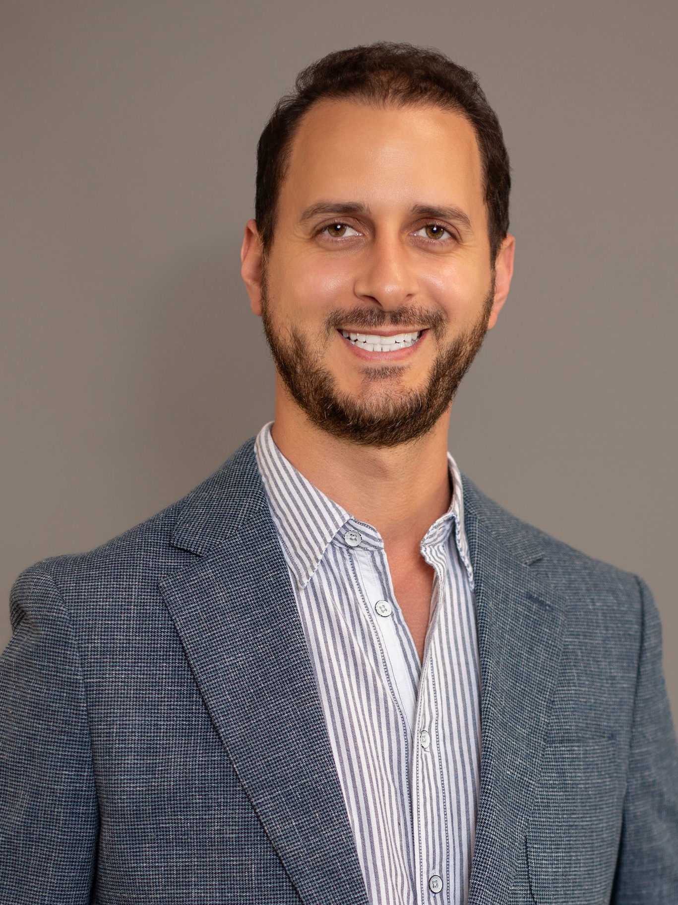 Dr. Gilberto Tostado, DDS
